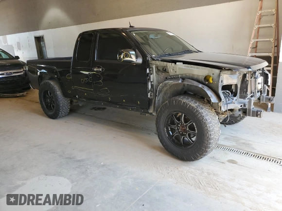 2010 GMC Canyon SLE1 with VIN 1GTJTCDE0A8101092, listed as a Copart auction lot 52311654 with 133,742 mi miles and Salvage title. Bid and sale history available at DreamBid. Image 4.