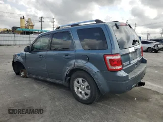 2010 Ford Escape Hybrid with VIN 1FMCU4K30AKC51022, listed as a Copart auction lot 51014615 with 128,275 mi miles and Salvage title. Bid and sale history available at DreamBid. Image 2.