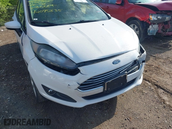 2019 Ford Fiesta SE z VIN 3FADP4BJ9KM136689, wystawiony jako IAAI lot #42095835 z przebiegiem 80 856 mil mil oraz . Historia ofert i sprzedaży dostępna na DreamBid. Obrazek 6.