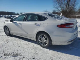 2018 Ford Fusion SE with VIN 3FA6P0HDXJR230360, listed as a Copart auction lot 87761215 with 60,305 mi miles and Salvage Title. Bid and sale history available at DreamBid. Image 2.