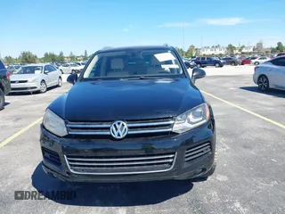 2013 Volkswagen Touareg Lux with VIN WVGEF9BP6DD004454, listed as a IAAI auction lot 41862958 with 239,548 mi miles and . Bid and sale history available at DreamBid. Image 12.