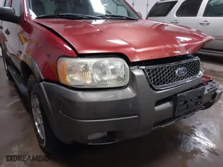 2003 Ford Escape XLT Popular 2 with VIN 1FMCU93173KA52806, listed as a IAAI auction lot 41696250 with 138,338 mi miles. Bid and sale history available at carsss.com. Image 17.