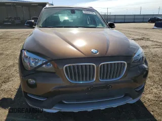 2015 BMW X1 xDrive28i z VIN WBAVL1C5XFVY35610, wystawiony jako Copart lot #54063125 z przebiegiem 115 279 mil mil oraz Szkoda całkowita • Salvage title. Historia ofert i sprzedaży dostępna na DreamBid. Obrazek 5.