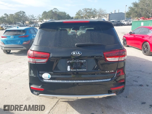 2016 Kia Sorento SX with VIN 5XYPK4A57GG023001, listed as a IAAI auction lot 41154189 with 93,399 mi miles. Bid and sale history available at carsss.com. Image 16.