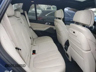 2020 BMW X5 M50i with VIN 5UXJU4C07LLE46002, listed as a Copart auction lot 77853984 with 74,098 mi miles and Salvage Title. Bid and sale history available at DreamBid. Image 11.