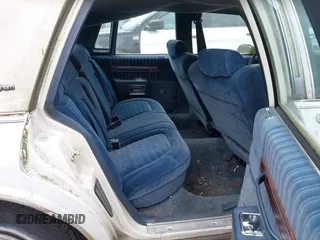 1990 Chevrolet Caprice z VIN 1G1BU54E9LA105479, wystawiony jako IAAI lot #42277687 z przebiegiem 30 947 mil mil oraz . Historia ofert i sprzedaży dostępna na DreamBid. Obrazek 8.
