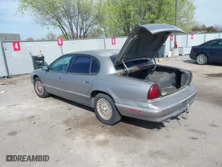 1997 Chrysler LHS with VIN 2C3HC56F9VH782972, listed as a IAAI auction lot 42035696 with 120,301 mi miles. Bid and sale history available at carsss.com. Image 3.