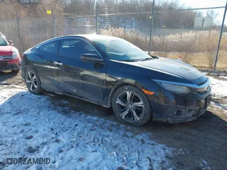 2016 Honda Civic Coupe Touring with VIN 2HGFC3B90GH354560, listed as a IAAI auction lot 41403805 with NaN miles. Bid and sale history available at carsss.com. Image 1.