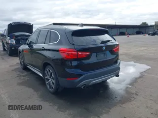 2017 BMW X1 sDrive28i with VIN WBXHU7C3XHP924635, listed as a IAAI auction lot 41744824 with 74,143 mi miles. Bid and sale history available at carsss.com. Image 3.