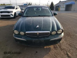 2004 Jaguar X-Type z VIN SAJEA51C04WD65097, wystawiony jako Copart lot #53825295 z przebiegiem 58 270 mil mil oraz Szkoda całkowita • Salvage title. Historia ofert i sprzedaży dostępna na DreamBid. Obrazek 5.