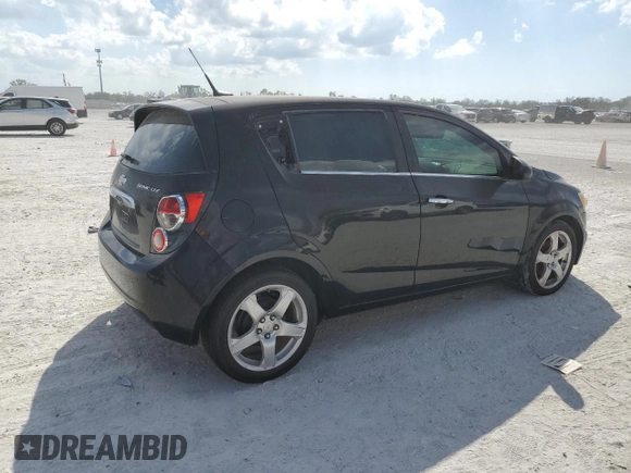 2012 Chevrolet Sonic LTZ z VIN 1G1JE6SH9C4130554, wystawiony jako Copart lot #45020925 z przebiegiem 152 038 mil mil oraz Czysty tytuł • Clean title. Historia ofert i sprzedaży dostępna na DreamBid. Obrazek 3.