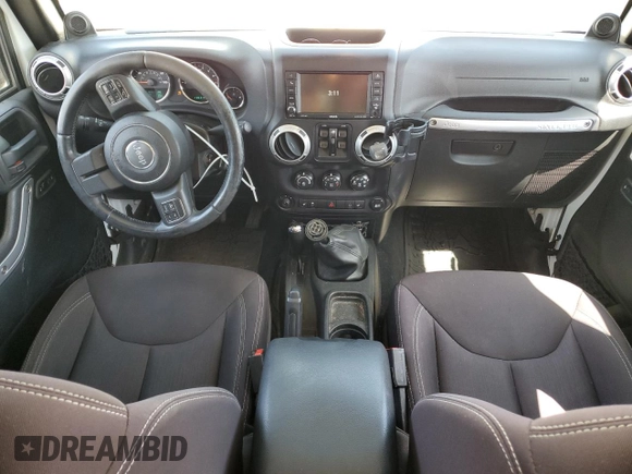 2014 Jeep Wrangler Unlimited Sahara z VIN 1C4BJWEG8EL188271, wystawiony jako Copart lot #59972535 z przebiegiem 130 314 mil mil oraz Szkoda całkowita • Salvage title. Historia ofert i sprzedaży dostępna na DreamBid. Obrazek 8.