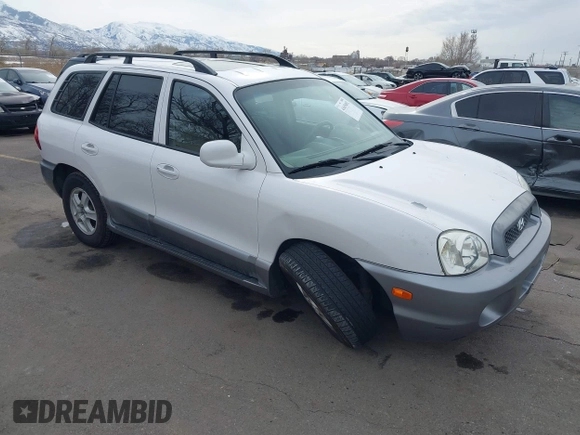 2004 Hyundai Santa Fe GLS with VIN KM8SC13DX4U609921, listed as a IAAI auction lot 41619492 with 113,592 mi miles. Bid and sale history available at carsss.com. Image 1.