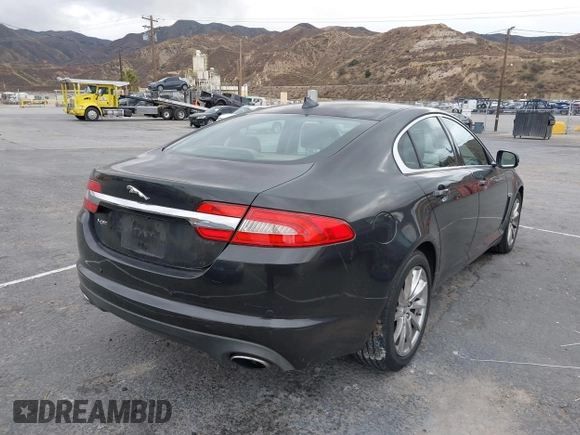 2013 Jaguar XF I4 RWD with VIN SAJWA0ES0DPS64027, listed as a IAAI auction lot 41569121 with 103,115 mi miles. Bid and sale history available at carsss.com. Image 4.