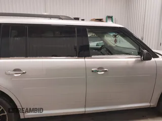 2015 Ford Flex Limited z VIN 2FMHK6D80FBA22700, wystawiony jako IAAI lot #41368354 z przebiegiem 168 054 mil mil oraz . Historia ofert i sprzedaży dostępna na DreamBid. Obrazek 14.