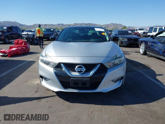 2016 Nissan Maxima SL z VIN 1N4AA6AP3GC377081, wystawiony jako IAAI lot #42235817 z przebiegiem 159 571 mil mil oraz . Historia ofert i sprzedaży dostępna na DreamBid. Obrazek 12.