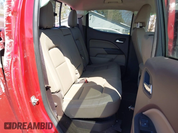 2015 GMC Canyon 4WD SLT z VIN 1GTG6CE38F1266466, wystawiony jako IAAI lot #41822501 z przebiegiem 26 479 mil mil oraz . Historia ofert i sprzedaży dostępna na DreamBid. Obrazek 8.
