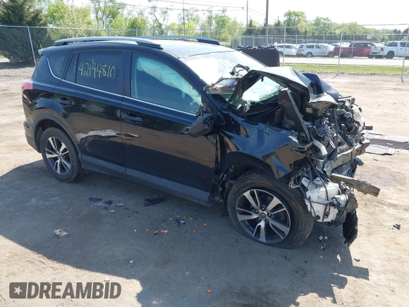 2018 Toyota RAV4 XLE with VIN 2T3WFREVXJW484872, listed as a IAAI auction lot 42144810 with Not provided miles and . Bid and sale history available at DreamBid. Image 1.