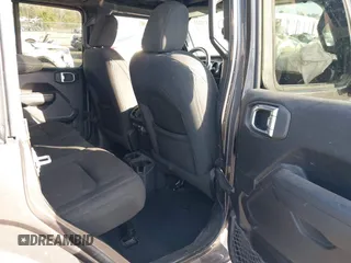 2022 Jeep Wrangler Unlimited Sport with VIN 1C4HJXDG1NW167066, listed as a IAAI auction lot 41572221 with 48,356 mi miles and . Bid and sale history available at DreamBid. Image 8.