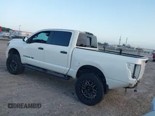 2019 Nissan Titan Pro-4X z VIN 1N6AA1E52KN534356, wystawiony jako IAAI lot #41998653 z przebiegiem 95 052 mil mil oraz . Historia ofert i sprzedaży dostępna na DreamBid. Obrazek 3.