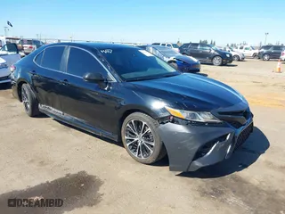 2018 Toyota Camry LE with VIN JTNB11HKXJ3071137, listed as a IAAI auction lot 41699856 with 102,310 mi miles. Bid and sale history available at carsss.com. Image 1.