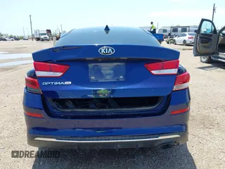 2019 Kia Optima LX z VIN 5XXGT4L38KG341070, wystawiony jako IAAI lot #42348351 z przebiegiem 112 143 mil mil oraz . Historia ofert i sprzedaży dostępna na DreamBid. Obrazek 17.