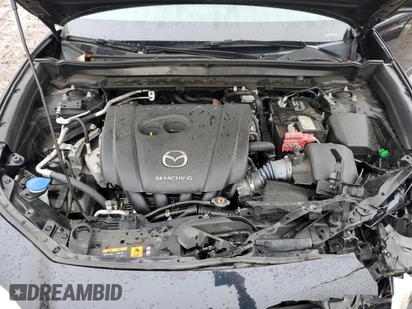 2021 Mazda CX-30 S with VIN 3MVDMBAL4MM209043, listed as a Copart auction lot 79406284 with 55,944 mi miles and Salvage title. Bid and sale history available at DreamBid. Image 14.