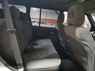 1995 Mitsubishi Montero z VIN 2BGF0126264046653, wystawiony jako Copart lot #81135584 z przebiegiem 254 106 mil mil oraz Czysty tytuł • Clean title. Historia ofert i sprzedaży dostępna na DreamBid. Obrazek 11.