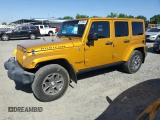 2014 Jeep Wrangler Unlimited Rubicon z VIN 1C4BJWFG3EL167827, wystawiony jako Copart lot #55129365 z przebiegiem 87 235 mil mil oraz Szkoda całkowita • Salvage title. Historia ofert i sprzedaży dostępna na DreamBid. Obrazek 1.
