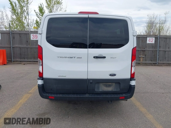 2023 Ford Transit Passenger XL with VIN 1FBAX2YG3PKA63237, listed as a IAAI auction lot 41996063 with 58,429 mi miles and . Bid and sale history available at DreamBid. Image 16.
