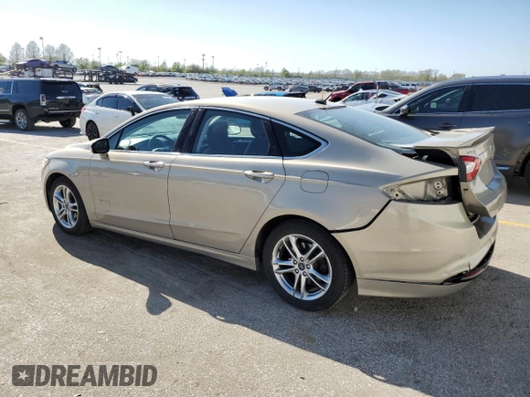 2016 Ford Fusion Titanium Hybrid with VIN 3FA6P0RU0GR153294, listed as a Copart auction lot 52723515 with 117,570 mi miles and Salvage title. Bid and sale history available at DreamBid. Image 2.