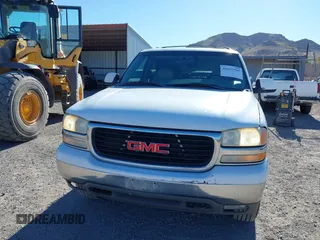 2002 GMC Yukon SLT z VIN 1GKEC13T32R256757, wystawiony jako IAAI lot #41657945 z przebiegiem 331 831 mil mil oraz . Historia ofert i sprzedaży dostępna na DreamBid. Obrazek 6.