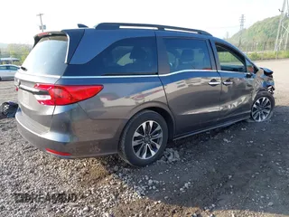 2022 Honda Odyssey EX-L z VIN 5FNRL6H78NB052651, wystawiony jako IAAI lot #42154729 z przebiegiem 23 mil mil oraz . Historia ofert i sprzedaży dostępna na DreamBid. Obrazek 4.