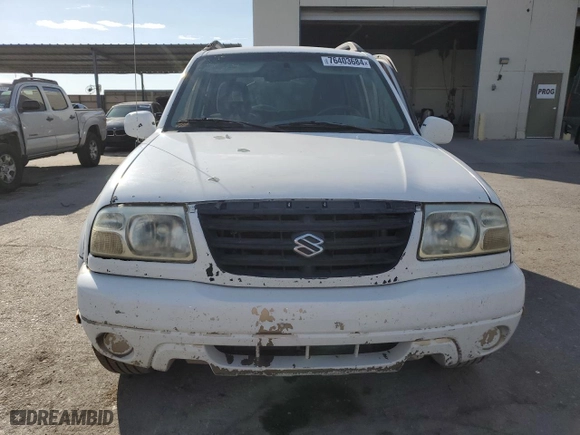 2002 Suzuki Grand Vitara JLX with VIN JS3TD62V824154031, listed as a Copart auction lot 76403684 with 208,529 mi miles and Salvage Title. Bid and sale history available at carsss.com. Image 5.