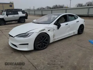 2021 Tesla Model S Plaid z VIN 5YJSA1E6XMF455258, wystawiony jako Copart lot #43788675 z przebiegiem Nie podano mil oraz Szkoda całkowita • Salvage title. Historia ofert i sprzedaży dostępna na DreamBid. Obrazek 1.