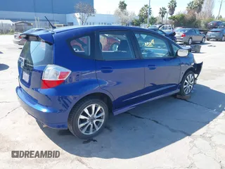 2013 Honda Fit Sport with VIN JHMGE8H52DC033096, listed as a IAAI auction lot 41767007 with 70,398 mi miles. Bid and sale history available at carsss.com. Image 4.