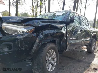 2019 Toyota Tacoma 4WD SR with VIN 3TMCZ5AN5KM221720, listed as a IAAI auction lot 41967986 with 83,701 mi miles. Bid and sale history available at carsss.com. Image 21.