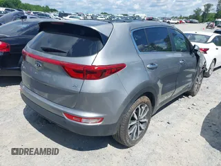 2019 Kia Sportage EX with VIN KNDPN3AC5K7591849, listed as a IAAI auction lot 42166917 with 50,984 mi miles and . Bid and sale history available at DreamBid. Image 4.