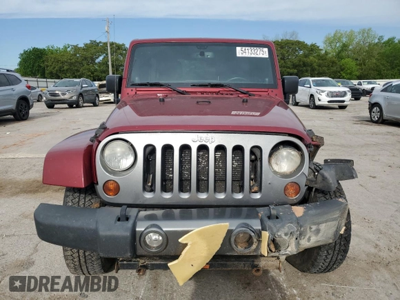 2013 Jeep Wrangler Unlimited Freedom z VIN 1C4BJWDG7DL582764, wystawiony jako Copart lot #54133275 z przebiegiem 183 507 mil mil oraz Szkoda całkowita • Salvage title. Historia ofert i sprzedaży dostępna na DreamBid. Obrazek 5.
