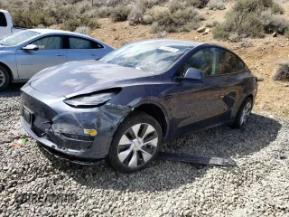 2022 Tesla Model Y Long Range z VIN 7SAYGDEE8NF323945, wystawiony jako Copart lot #51389735 z przebiegiem Nie podano mil oraz Szkody całkowita. Historia ofert i sprzedaży dostępna na DreamBid. Obrazek 1.