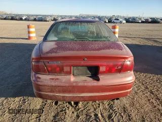 1999 Buick Regal LS with VIN 2G4WB52K0X1553709, listed as a Copart auction lot 75489254 with 243,467 mi miles and Salvage Title. Bid and sale history available at carsss.com. Image 6.