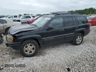 2000 Jeep Grand Cherokee Laredo z VIN 1J4GW48S1YC326453, wystawiony jako Copart lot #57332675 z przebiegiem 290 059 mil mil oraz Tytuł czysty. Historia ofert i sprzedaży dostępna na DreamBid. Obrazek 1.