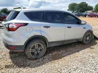 2018 Ford Escape S with VIN 1FMCU0F78JUB79464, listed as a Copart auction lot 58812925 with 104,642 mi miles and Salvage title. Bid and sale history available at DreamBid. Image 3.
