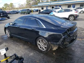 2014 Lincoln MKZ z VIN 3LN6L2GK3ER802789, wystawiony jako Copart lot #86357034 z przebiegiem 215 548 mil mil oraz Szkoda całkowita • Salvage title. Historia ofert i sprzedaży dostępna na DreamBid. Obrazek 2.