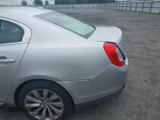 2013 Lincoln MKS с VIN 1LNHL9DK3DG604712, выставлен на аукционе IAAI как лот 42351237 с пробегом 144 927 миль миль и . История ставок и продаж доступна на DreamBid. Изображение 15.