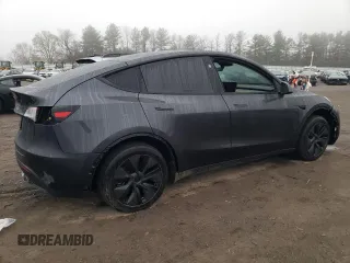 2025 Tesla Model Y Long Range z VIN 7SAYGDED9SF269767, wystawiony jako Copart lot #51588985 z przebiegiem 1 943 mil mil oraz Szkoda całkowita • Salvage title. Historia ofert i sprzedaży dostępna na DreamBid. Obrazek 3.