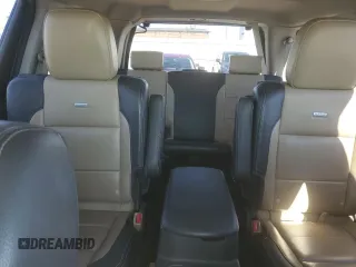 2014 Nissan Armada Platinum z VIN 5N1BA0NF8EN610303, wystawiony jako Copart lot #80653974 z przebiegiem 119 723 mil mil oraz Szkoda całkowita • Salvage title. Historia ofert i sprzedaży dostępna na DreamBid. Obrazek 10.