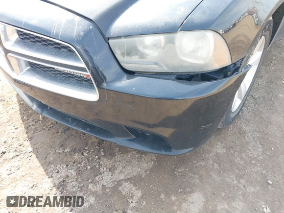 2014 Dodge Charger SE with VIN 2C3CDXBG4EH268898, listed as a IAAI auction lot 41790753 with 318,732 mi miles and . Bid and sale history available at DreamBid. Image 6.
