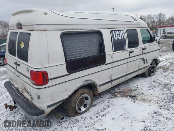 1999 Dodge Cargo Conversion with VIN 2B6HB11Y8XK563608, listed as a IAAI auction lot 41726411 with 199,239 mi miles and . Bid and sale history available at DreamBid. Image 4.