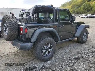2023 Jeep Wrangler Rubicon with VIN 1C4HJXCGXPW545938, listed as a Copart auction lot 73939634 with 13,590 mi miles and Salvage title. Bid and sale history available at DreamBid. Image 3.